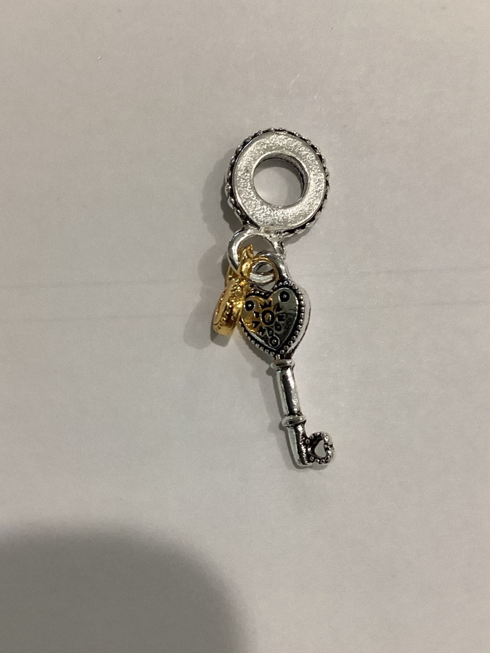 Silver Key Charm with Gold Accent Tag